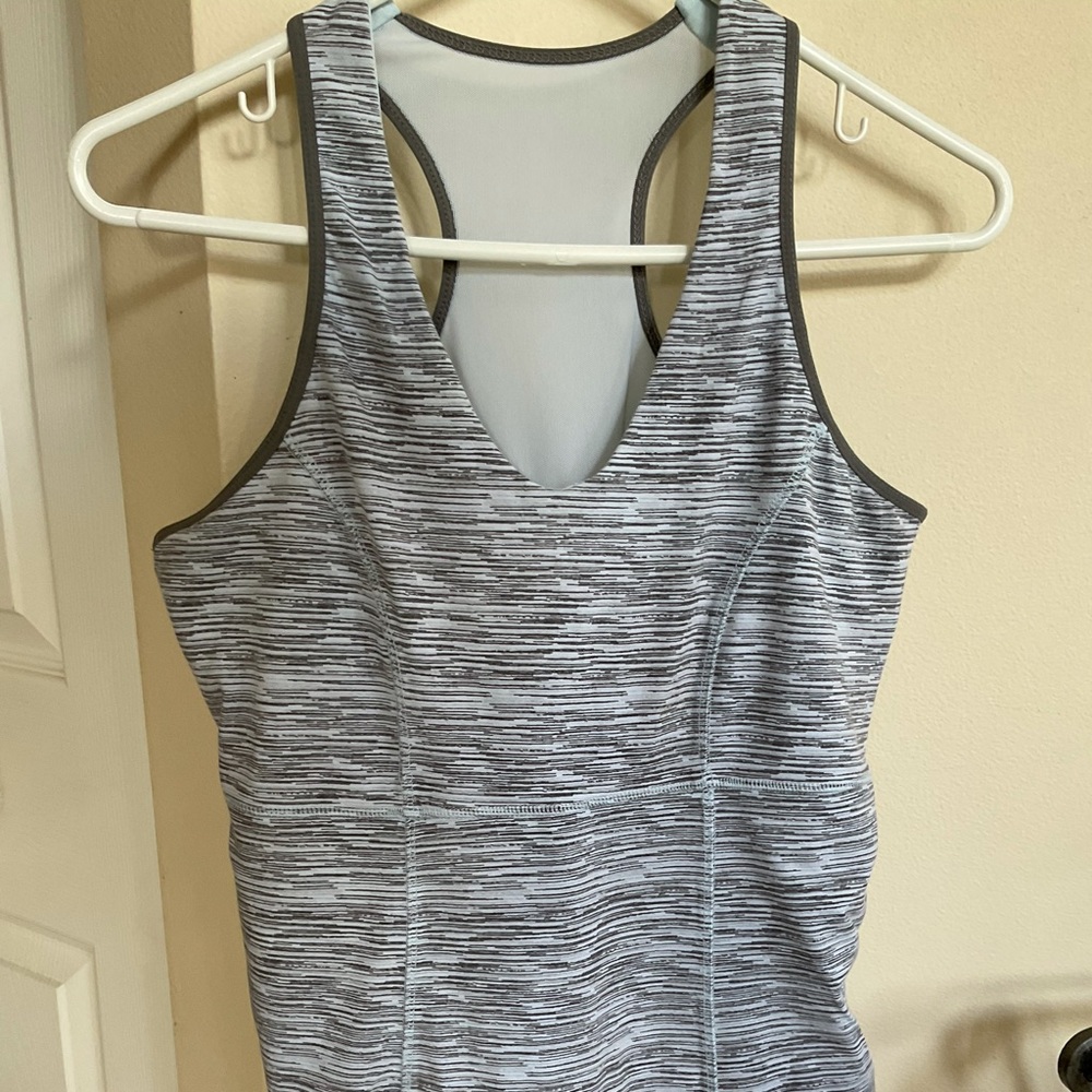 Sports wear, gray and black, size XL.